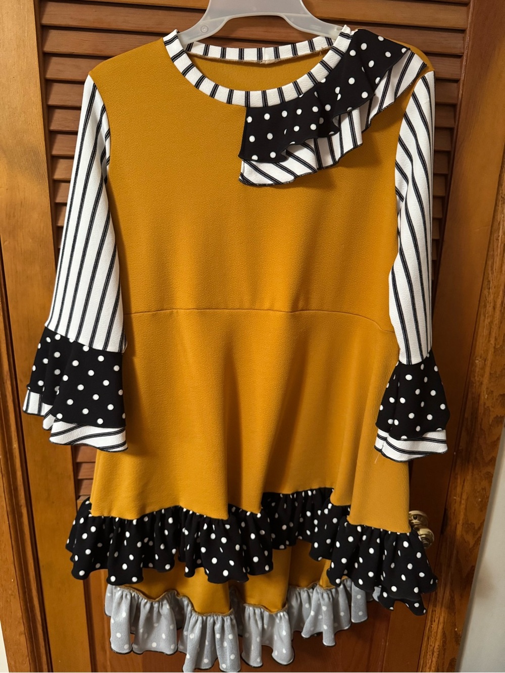 Mustard Ruffle Hem Top with Black & White Accent